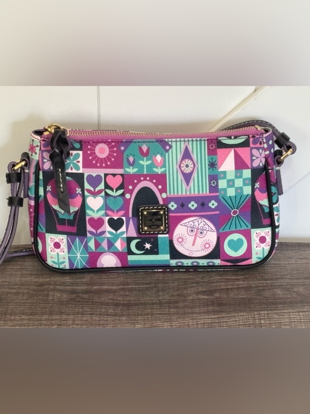 EUC Dooney & Bourke It’s a Small World Pouchette Crossbody Bag